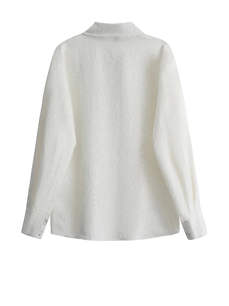 Divine Embroidered Textured Blouse